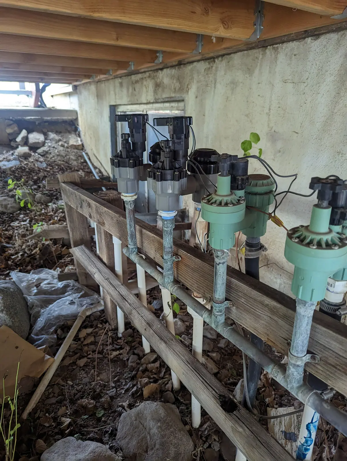 Irrigation valve bank assembly during a sprinkler repair project